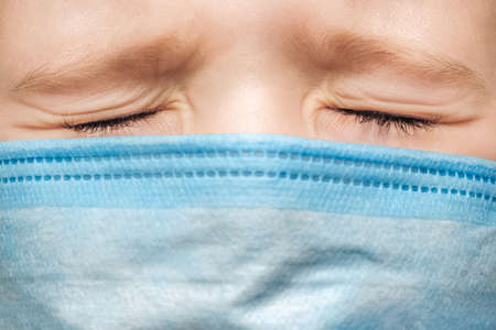 Healthcare problems child closed eyes expression. Strong pain face kid treatment medical patient boy...