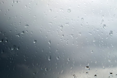 water drops background. Close up of rain drops on the windowの写真素材