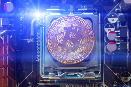 Silver bitcoin coin. Bitcoin cryptocurrency. Blockchain technology and bitcoin mining concept