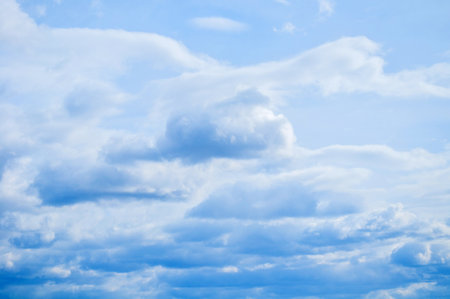 Sky landcape. Blue sky background with white dramatic colorful clouds, stormy sky viewの写真素材