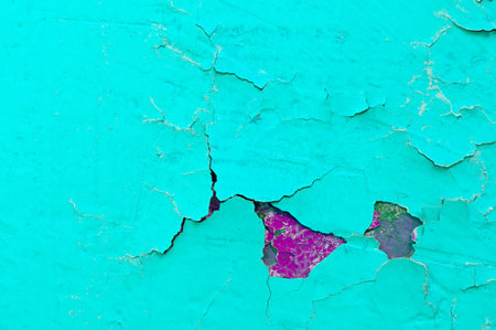 Peeling paint background, turquoise peeling paint on the old rough concrete surface, peeling paint...