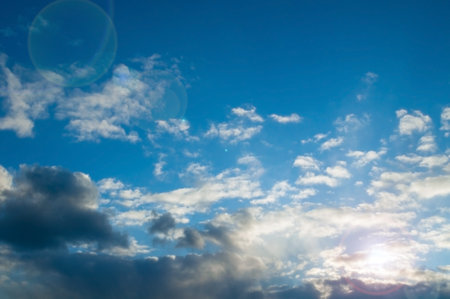 Sunset sky landscape with white colorful sunset sky clouds floating in the blue sky. Sunset sky...