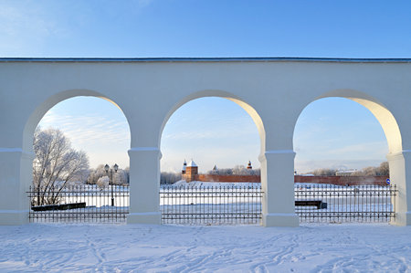 Veliky Novgorod Russia. Towers of Novgorod Kremlin fortress in the arches of ancient trades of Yaroslav Courtyard in Veliky Novgorod, Russiaの写真素材