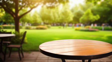 Wooden table spring nature bokeh background, empty wood desk product display mockup with green park sunny blurry abstract garden backdrop landscape ads showcase presentation. Mock up, copy space.の素材