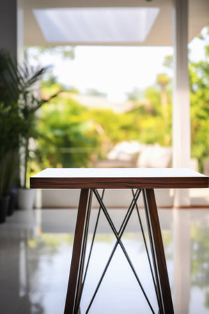 Wooden kitchen home table bokeh background, empty wood desk tabletop food counter surface product display mockup with blurry cafe abstract backdrop advertising presentation. Mock up, copy space.の素材