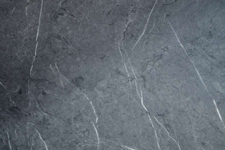 Gray scratched stone texture on background. Texture wallpaperの写真素材