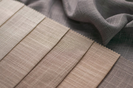Fabric in milk, beige and gray colors for home textiles and curtains. The color palette of fabric...