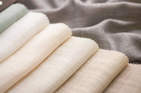 Fabric in milk, beige and gray colors for home textiles and curtains. The color palette of fabric for curtains.の写真素材