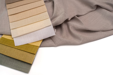 Beige olive fabric samples for curtains, bedspreads and pillows. Fabric for interior decorの写真素材