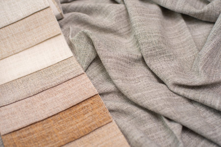 The color palette of fabric for curtains. Fabric in milky, gray and brown colorsの写真素材