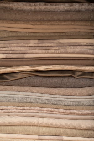 Brown and beige fabric samples. Fabrics for curtains and furniture