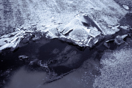 Winter Ice Formation with Natural Cracks and Reflections.