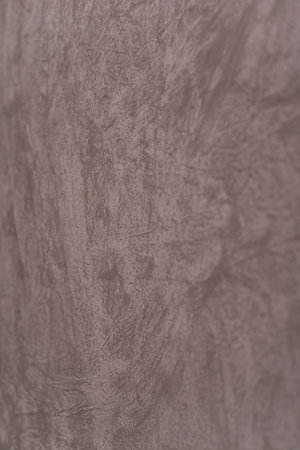 Textured Wall Surface with Scratches and Patina Abstract Decorative Plaster Background.