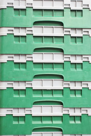 colored plastic boxes stand one in the other. background, textureの写真素材