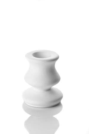 white candlestick, plaster close up isolate on a white backgroundの写真素材