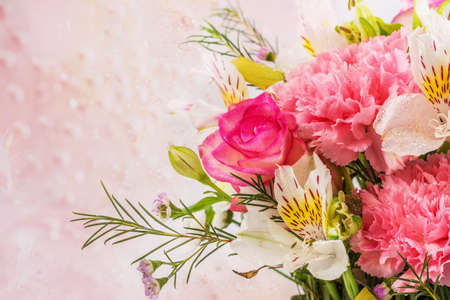 Postcard with fresh bouquet of flowers on isolated backgroundの写真素材