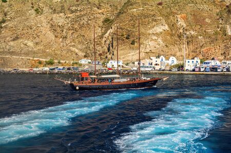 6.26.2013 - The touristic boat in port of island Santorini, Cyclades island, Greeceのeditorial素材