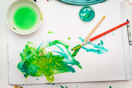 Close up kids painting with watercolorの写真素材