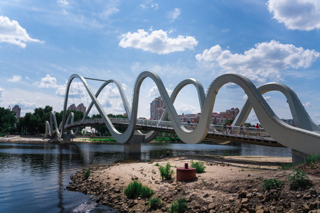 The pedestrian bridge in Kyiv park Natalkaの写真素材