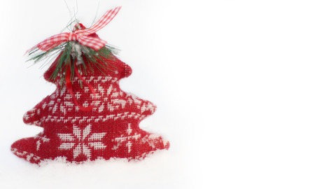 Christmas background with Christmas toys in the snowの写真素材