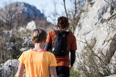 Two women hiking. A woman with backpack.のeditorial素材