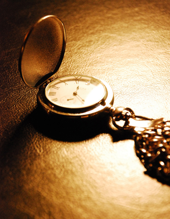 Shot under limited lighting, my pocket watched looked picture perfect just sitting where it was.の写真素材