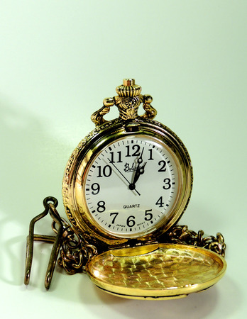 Shot under limited lighting, my pocket watched looked picture perfect just sitting where it was.の写真素材