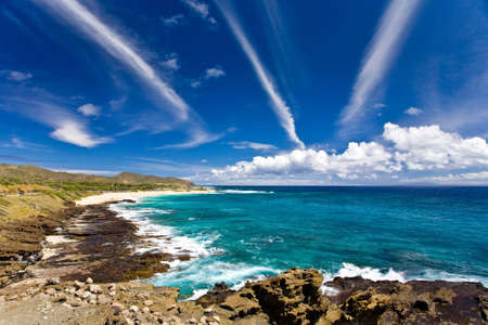 Rock formations forground this beautiful ocean scenic. Shot in Oahu, Hawaii.の写真素材