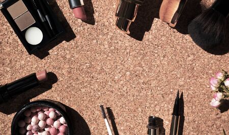 A set of decorative cosmetics on a pink textured background. Top viev. Flat lay.の写真素材