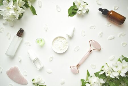 Face rollers, gouache massager scraper, made of natural amethyst. Self-care kit. home Spa products on a white backgroun.の写真素材