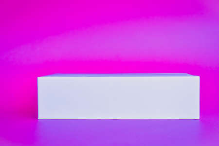 Abstract empty rectangle. The podium in a bright pink neon light stage background for minimum of this content of the advertising banner layout design of the product.の写真素材