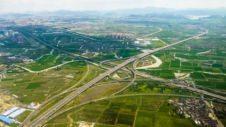 Aerial view of Jiangshan North Interchange and suburban landscape, Ningboの写真素材