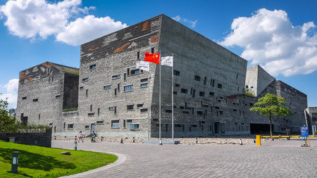 Exterior of Ningbo Museum in blue sky, designed by Wang Shuのeditorial素材
