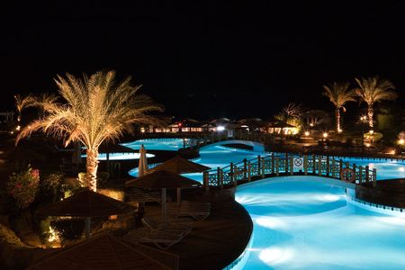 Swimming pool at nightの写真素材
