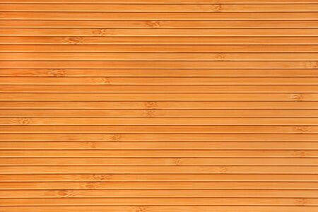 Bamboo orange textured background closeupの写真素材