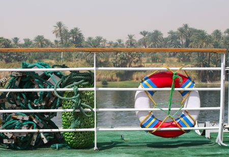 Life buoy on a yacht deck on the riverの写真素材