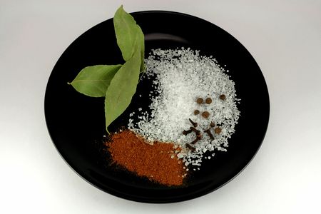 black plate with spiceの写真素材