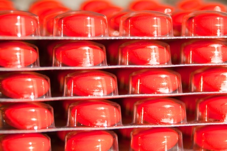 round red drugs on shining packedの写真素材