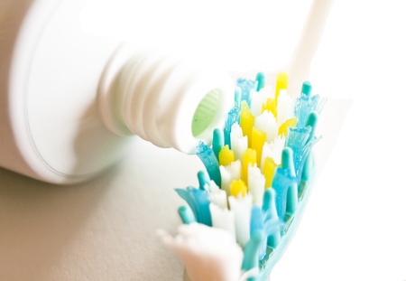coloured tooth brush and tube toothpasteの写真素材