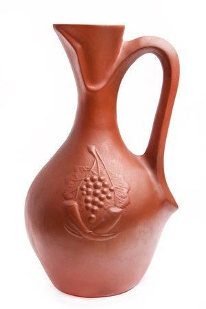 traditional clay jug for wine on white backgroundの写真素材