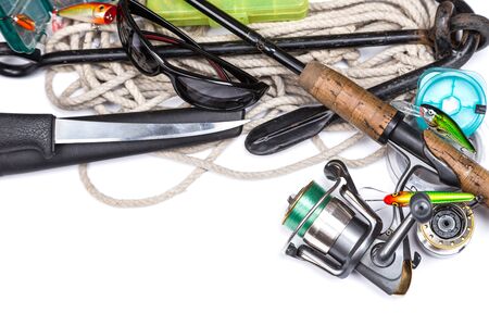 fishing tackles and anchor with cord on white backgroundの写真素材