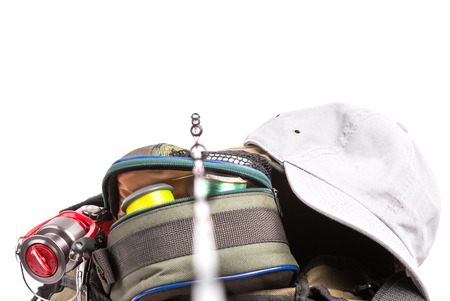 selective focus the guide ring on rod with background from fishing tackles in handbag