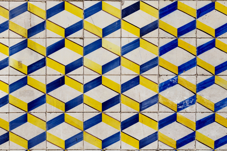 traditional azulejos tiles on facade of old house in Portugalの写真素材