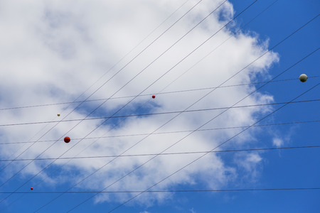 electric wires in blue sky with cloud