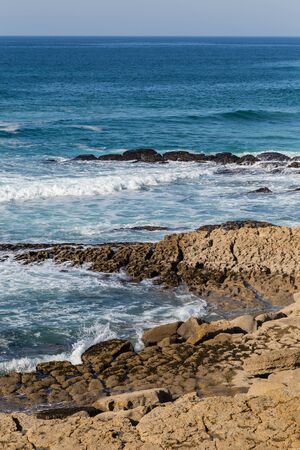 landscape atlantic coastline in europe, with surfs in bay of cityの写真素材