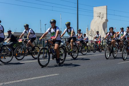 LISBON, PORTUGAL - July 23,2017: Start event is "World Bike Tour 2017" on street of european city Liabon near tower of Belem and Padrao dos Descobrimentos.のeditorial素材