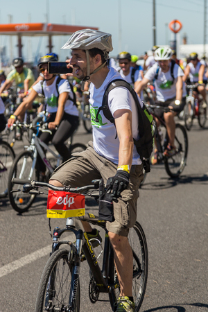 LISBON, PORTUGAL - July 23,2017: Start event is "World Bike Tour 2017" on street of european city Liabon near tower of Belem and Padrao dos Descobrimentos.のeditorial素材