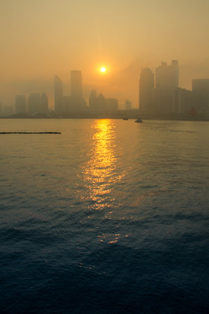 sunset at hong kong, view from Victoria harbor.の写真素材