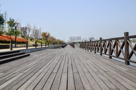 Wooden walkway in the park, closeup of photo.の写真素材