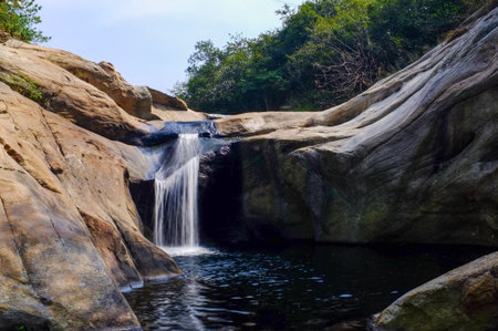 Beautiful waterfall in the forest at Phu Kradueng National Park, Loei, Thailandの写真素材